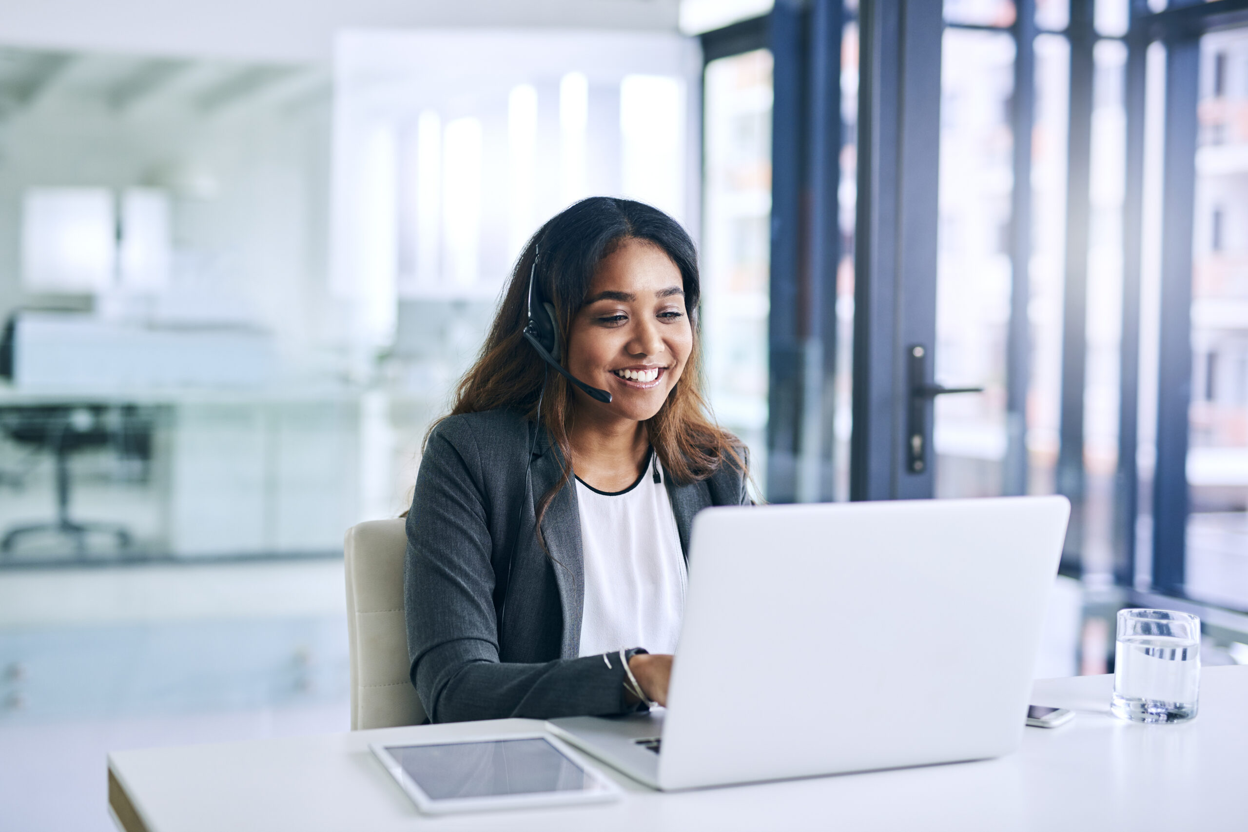 Female sales professional holding a consultation call with a prospect