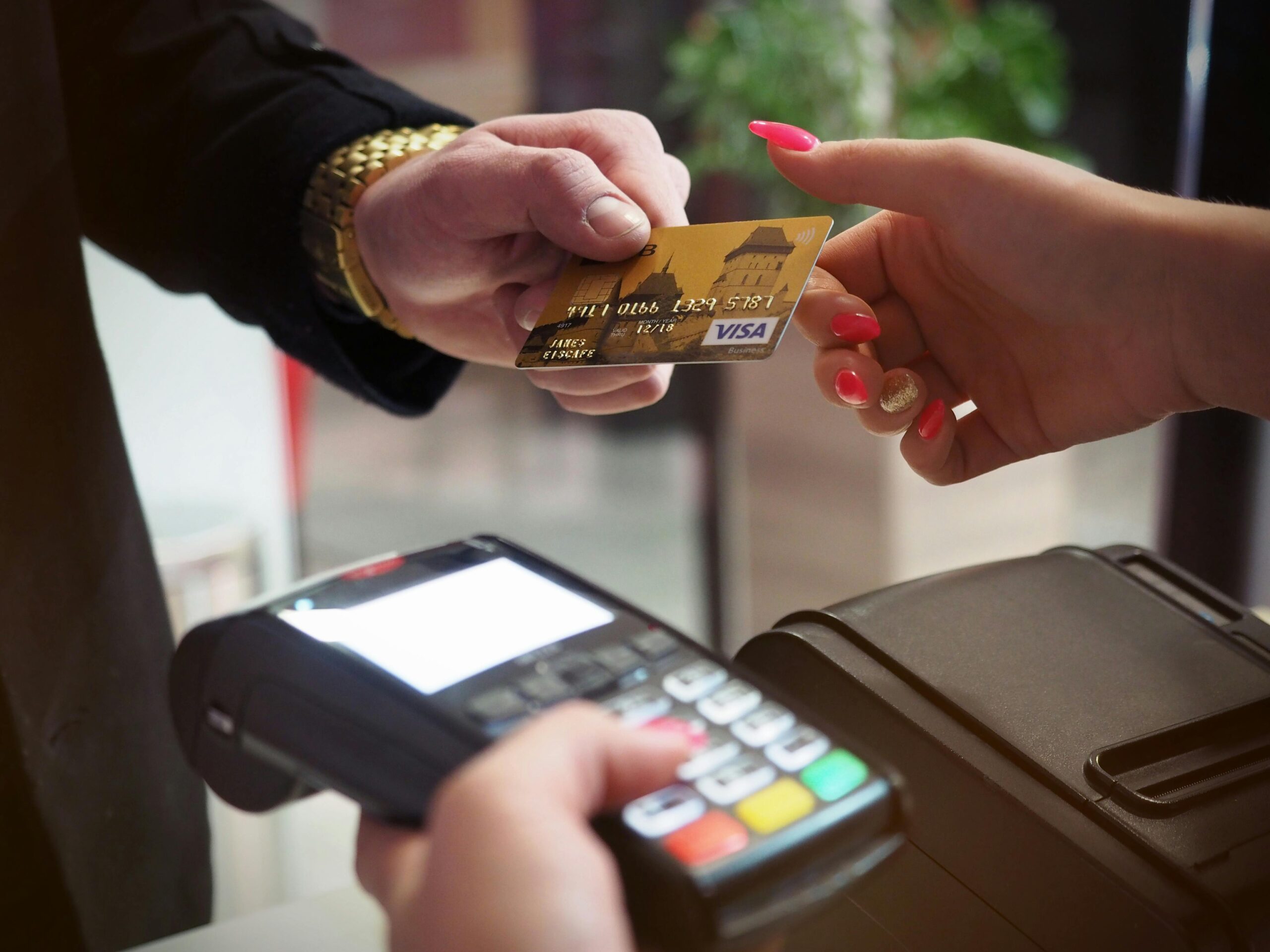 Image of purchasing something from a salesperson