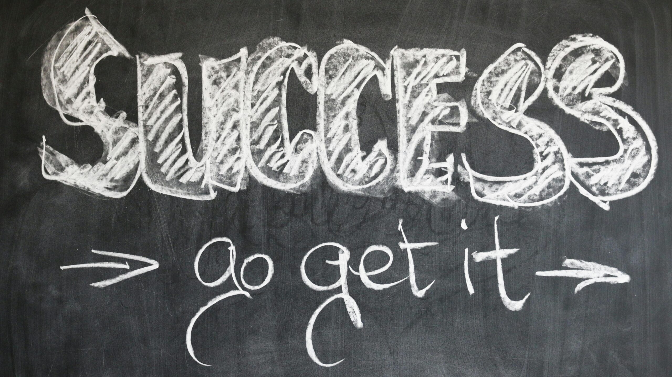 Image of the word "success" on a chalkboard