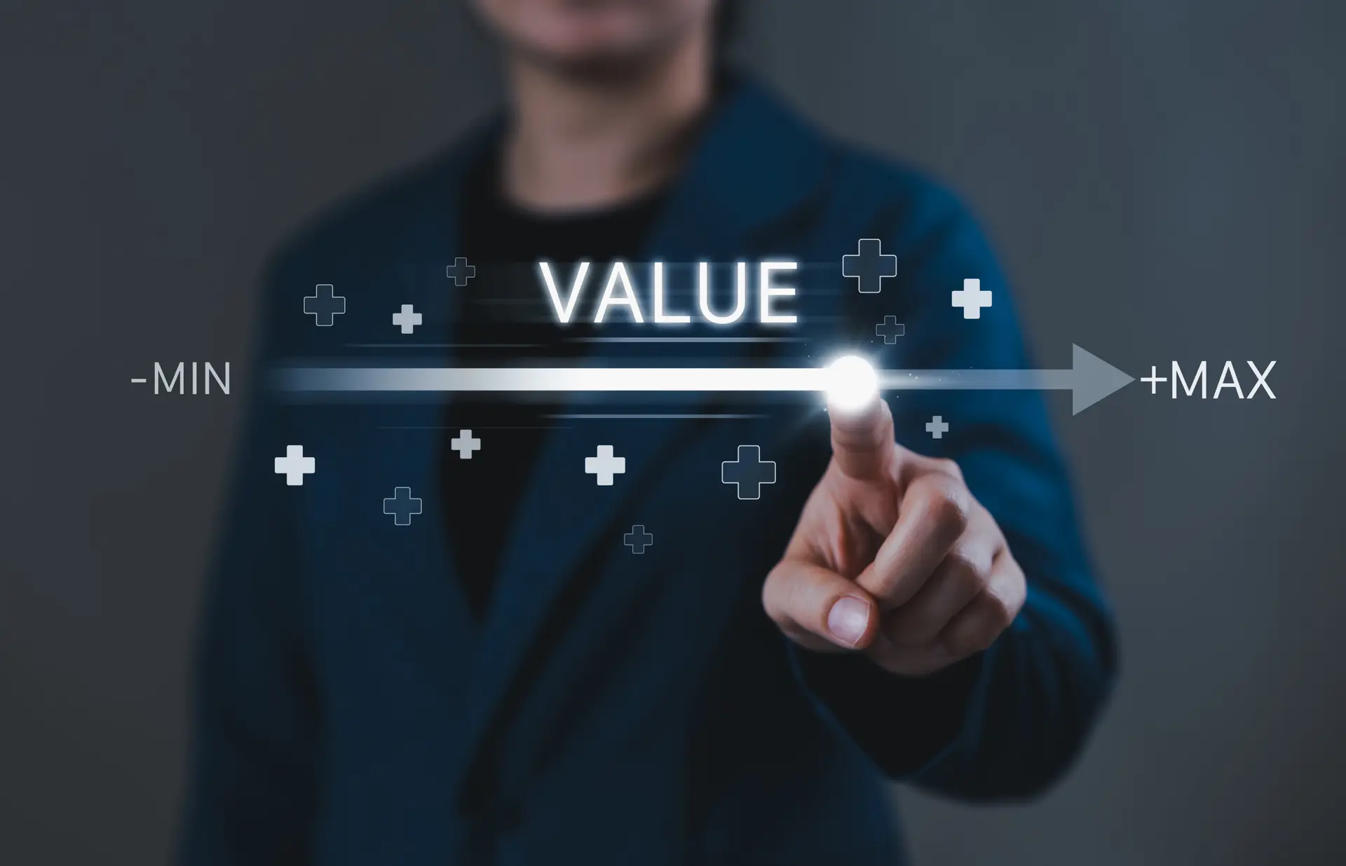 Image of man pressing index finger on a graphic that says "value"