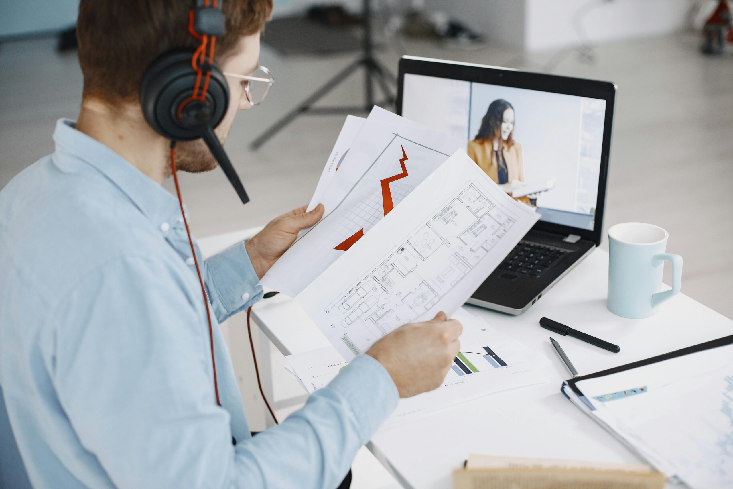 Image of a male holding a virtual sales meeting with prospect